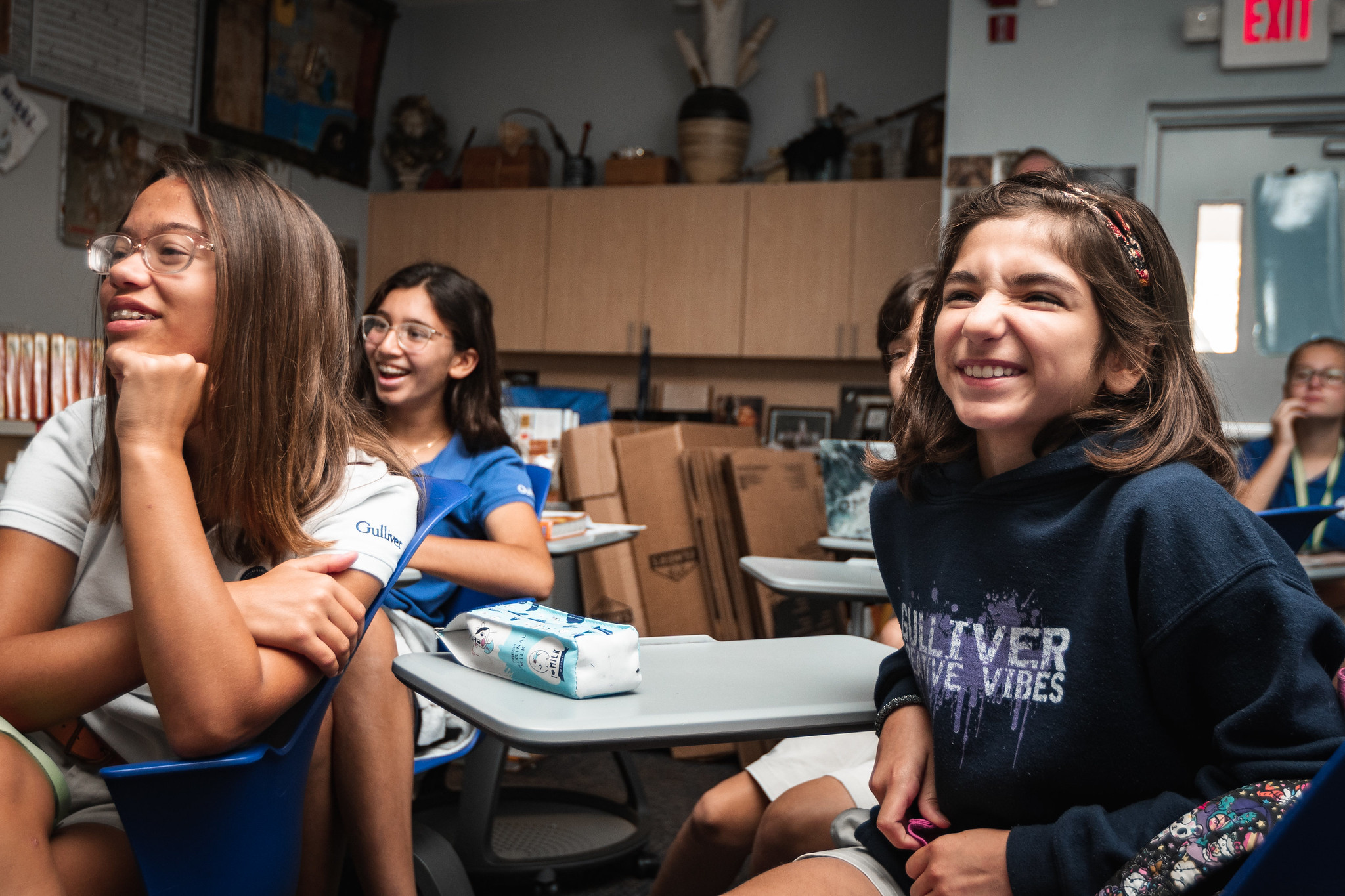 Students smiling during class.